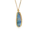 Handcrafted boulder opal and 18k gold necklace against a white background