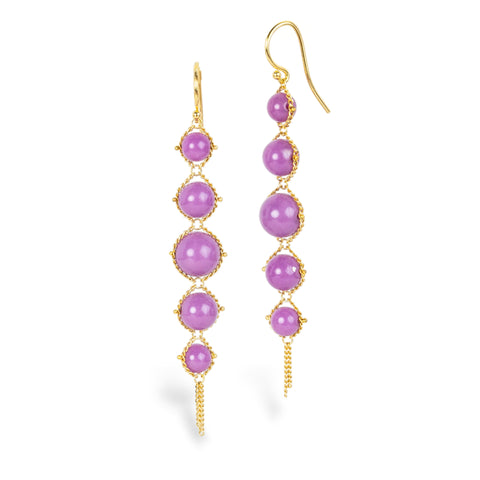 A pair of gold dangle earrings with five purple phosphosiderite stones of varying sizes, against a plain white background.