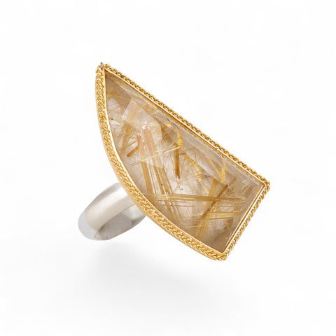 Rutilated quartz fine jewelry ring with an 18k gold bezel and sterling silver band