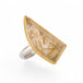 Rutilated quartz fine jewelry ring with an 18k gold bezel and sterling silver band