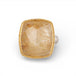 Gold and silver ring with a rutilated quartz stone on a white background