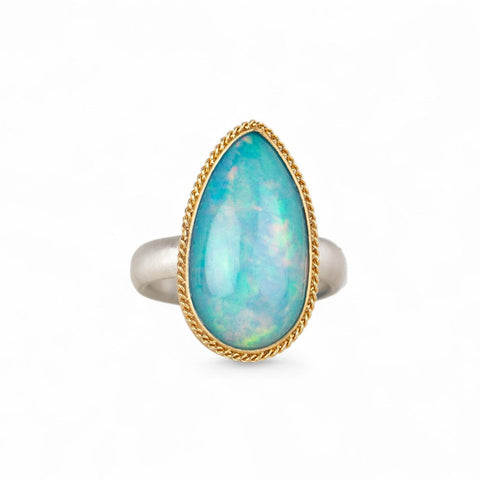 Ethiopian opal ring with 18k gold bezel and sterling silver band