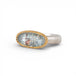 Gold and silver ring with topaz stone on a white background