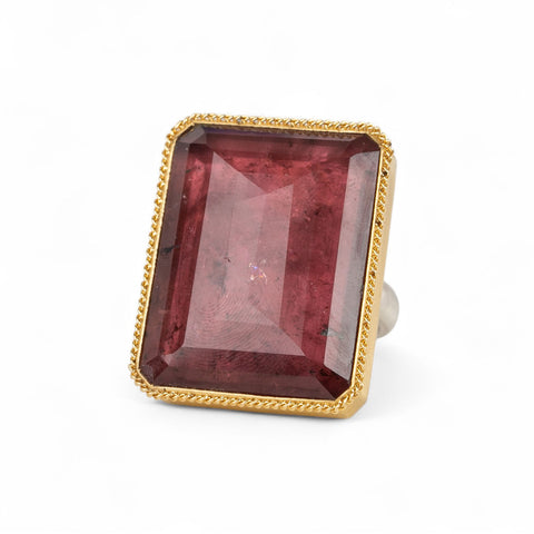 Handcrafted mixed metals ring with a tourmaline gemstone, 18k gold bezel and sterling silver band