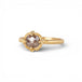Gold ring with a brown diamond on a white background