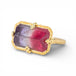 Gold ring with a faceted watermelon tourmaline gemstone on a white background