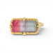 Gold ring with a rectangular watermelon tourmaline gemstone on a white background