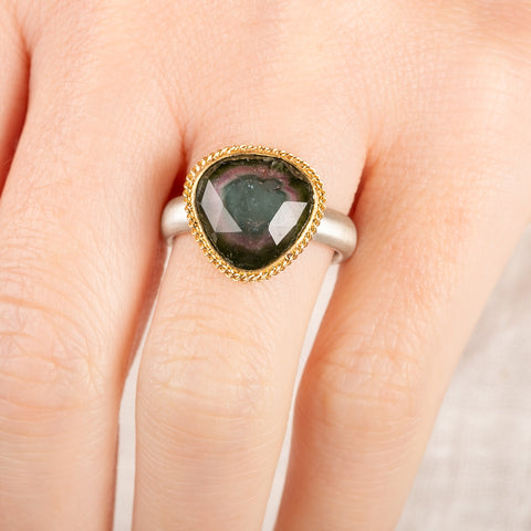 Handcrafted watermelon tourmaline ring with an 18k gold bezel and sterling silver band