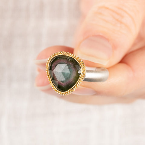 Handcrafted watermelon tourmaline ring with an 18k gold bezel and sterling silver band