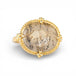 Gold ring with a dendritic quartz stone on a white background