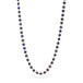 Gold chain necklace with lapis gemstones on a white background