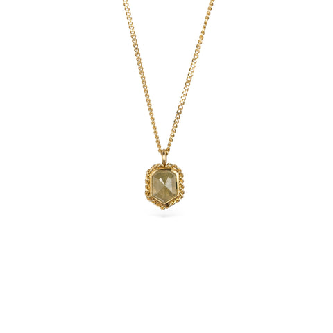 Gold necklace with a diamond pendant on a white background