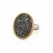 Gold and silver ring with slate with pyrite stone on a white background