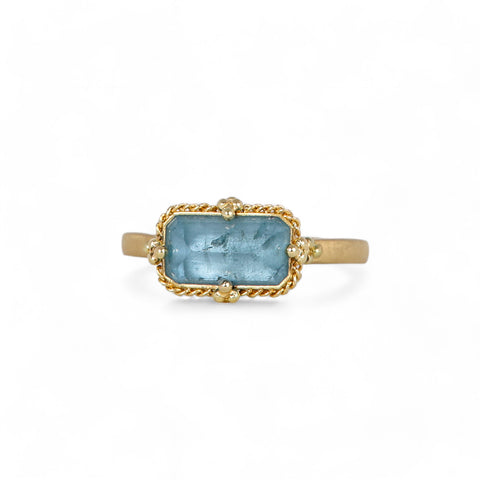 Aquamarine ring on white