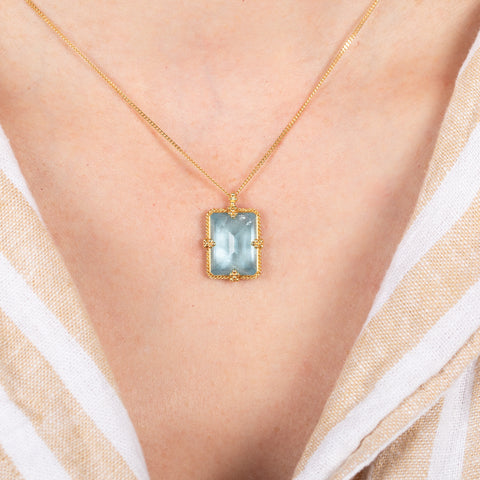 Rectangular aquamarine necklace on a model  close up