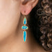 Australian opal and 18k gold earrings on model