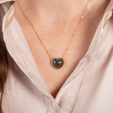 Diamond heart necklace on model