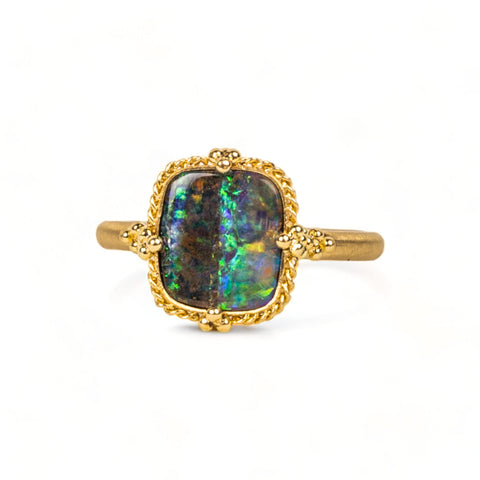 Boulder Opal ring on white background