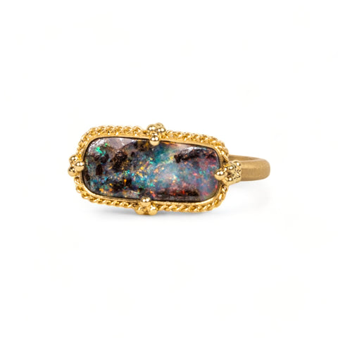 Boulder Opal ring on white background