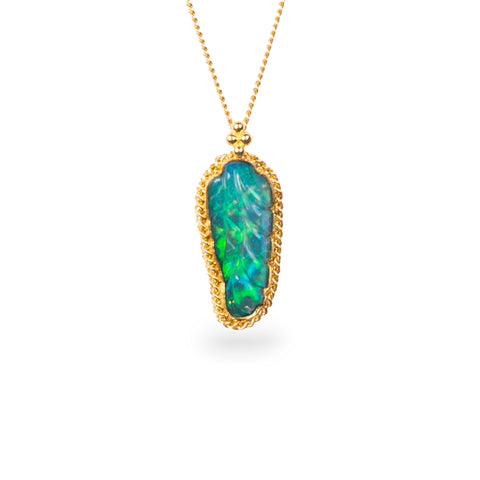 Carved ethiopian opal necklace on white background