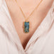 Carved Labradorite Owl Necklace on model
