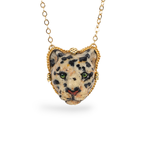 Carved leopard jasper necklace.