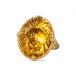 Carved citrine lion ring on white background