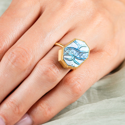 Carved labradorite ring on model side view