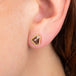 Diamond stud earring on model
