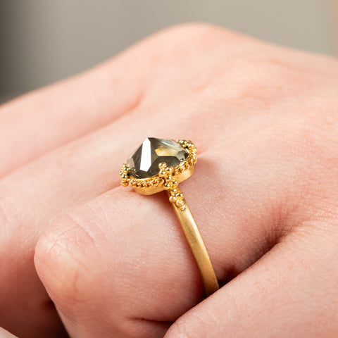Champagne diamond ring side view on model