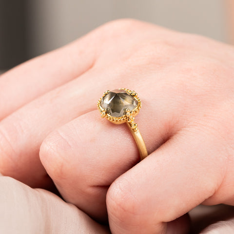 Champagne diamond ring  on model close up