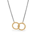 Oxidized silver necklace with interlocking 18k gold hoops close up