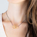 Contrast interlocking hoop necklace on a model