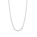 Oxidized silver chain necklace with turquoise gemstone beads encircled in 18k yellow gold.