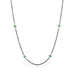 Oxidized silver chain necklace with turquoise gemstone beads encircled in 18k yellow gold.