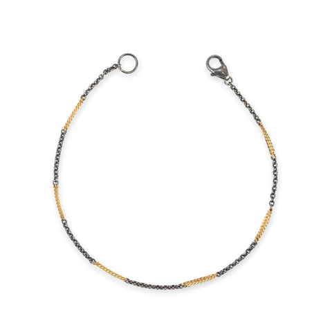 Bracelet with mixed metals in oxidized silver and 18k gold