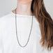 Oxidized silver and gold necklace with labradorite on a model