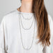 Contrast necklace in pearl sizes