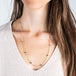 18k gold and london blue topaz on a model