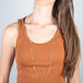 18k gold and pearl woven necklace on a model
