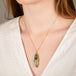 Boulder opal necklace on model