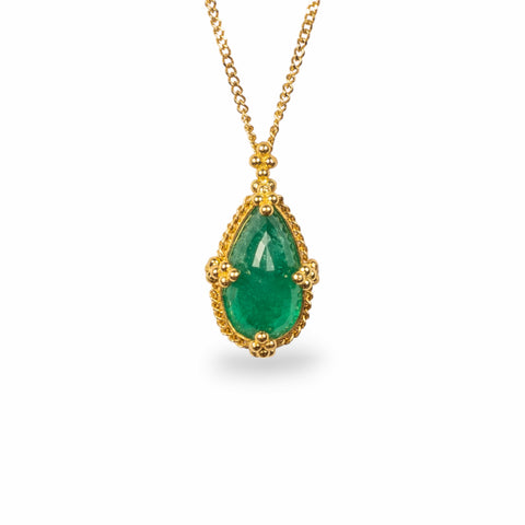 Emerald necklace on white background