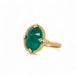 The side view of a handmade 18k yellow gold and oval-shaped emerald gemstone ring.