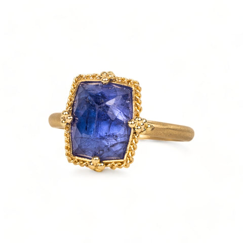 Tanzanite ring on white background