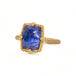 Tanzanite ring on white background