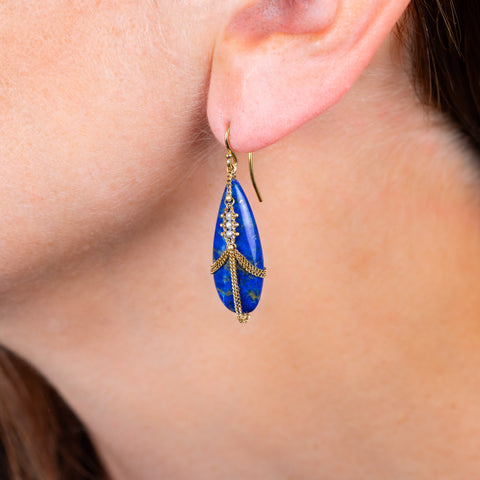 Draped Lapis earring on a model side view