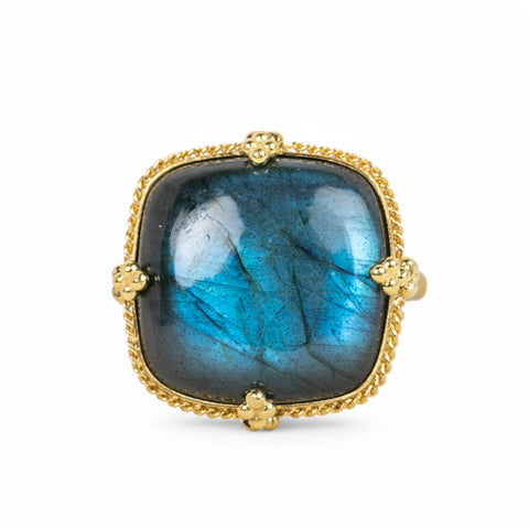 A square-shaped Labradorite gemstone ring set in a handcrafted 18k yellow gold bezel.