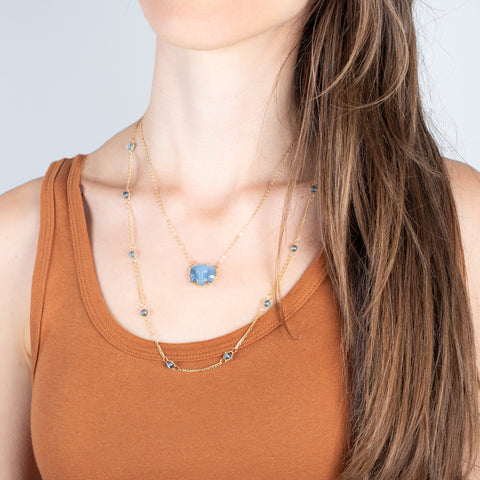 Whisper chain london blue topaz and blue elephant on model