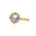 A mabe pearl ring with an 18k gold setting and band, shown against a white background.