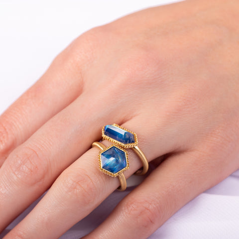 Group of moonstone rings on model